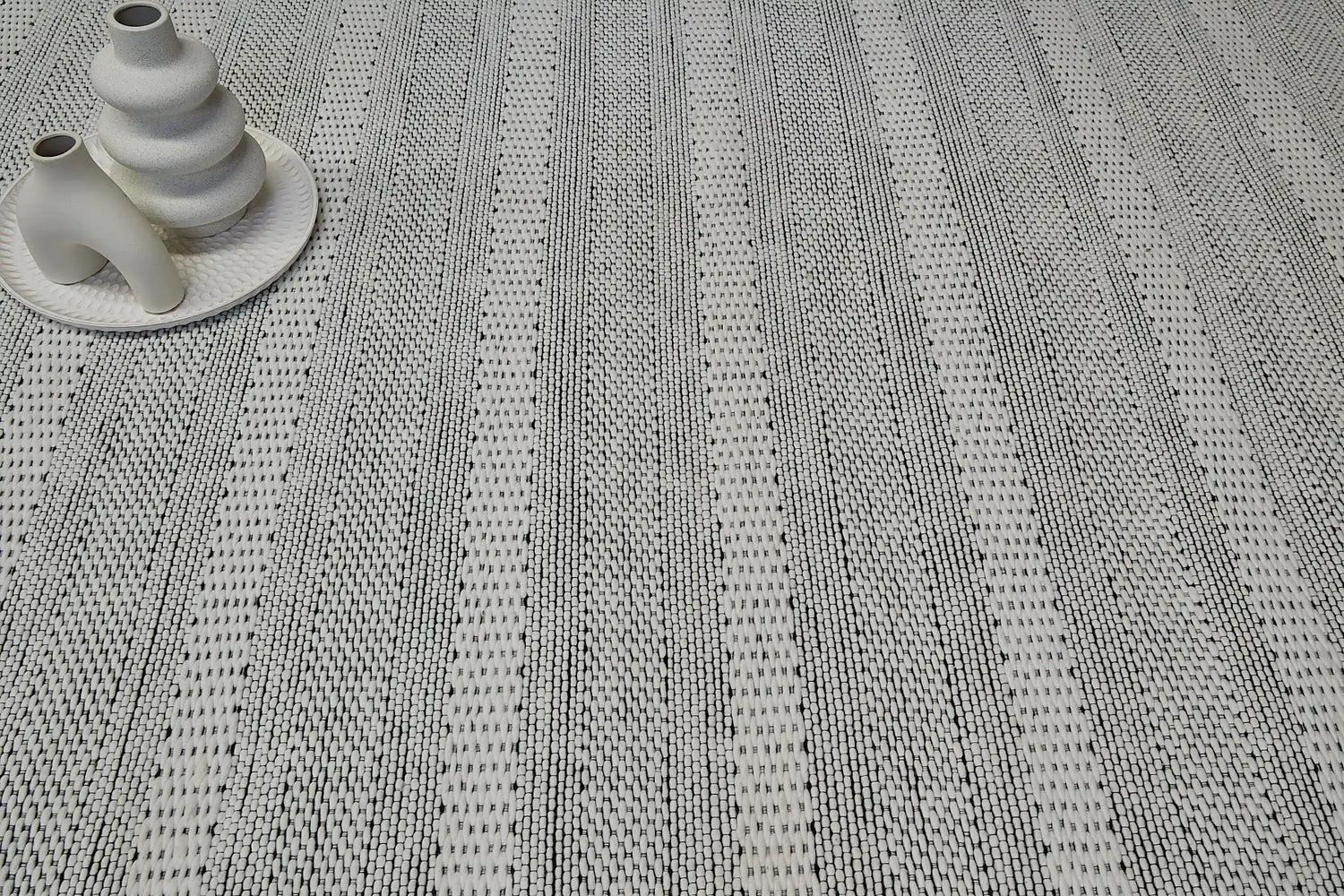 The Albi Collection are hand woven rugs crafted from 100% recycled PET yarn.  Albi comes in 4 colours in 3 sizes.