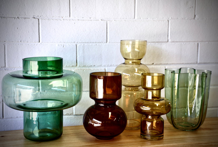 The Ochoco Glass Vase Collection features 5 different styles, sizes and shapes, with multiple colours. From sleek and slender to round and wavy!
