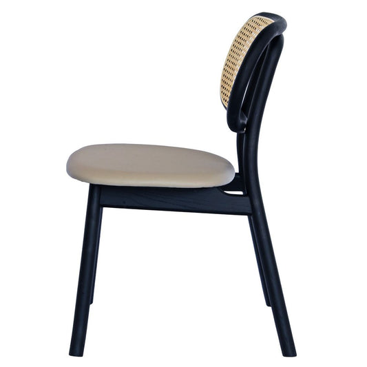 The Apache Black Dining Chair is a coastal/contemporary dining chair. Crafted with solid ash frame, polyurethane seat and a rattan back. Colours Black Frame, Grey Polyurethane seat and natural rattan seat back. Measuring 530 wide x 550 depth x 450 seat height and a back height of 780. Side Plain.