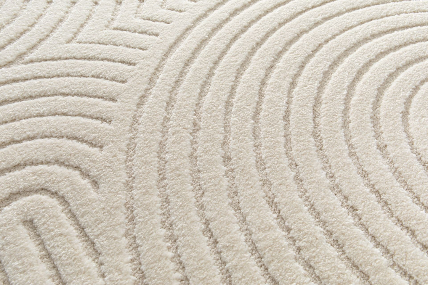 Arches - Cream, a modern rug design crafted with a unique blend of Heat Set Polypropylene and Polyester shrink yarn. Top Close.
