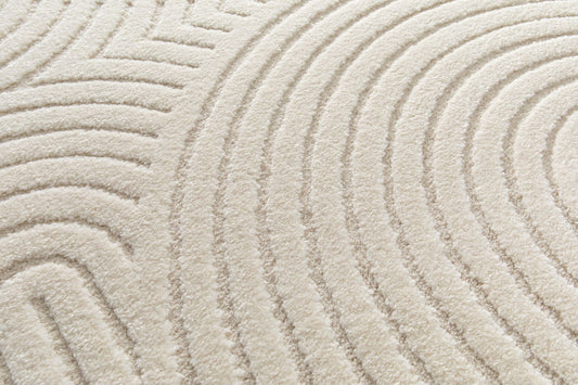 Arches - Cream, a modern rug design crafted with a unique blend of Heat Set Polypropylene and Polyester shrink yarn. Top Close.
