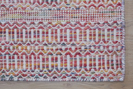 Arizona - Cherry is a Hand Woven Wool Flatweave. With a Geometric Tribal Design. Colour White with Red and Orange accents. Sizes, 160 X 230, 200 X 290 and 240 X 340. Corner.