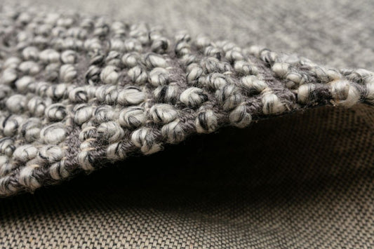 Avenue Shale is a hand woven PET Yarn (Recycled Plastics) Rug. It features a soft wool-like feel with a modern/contemporary design. Colour Shale, grey white and black. Sizes 155 X 225, 200 X 290, 240 X 320 and 300 X 400. Side.