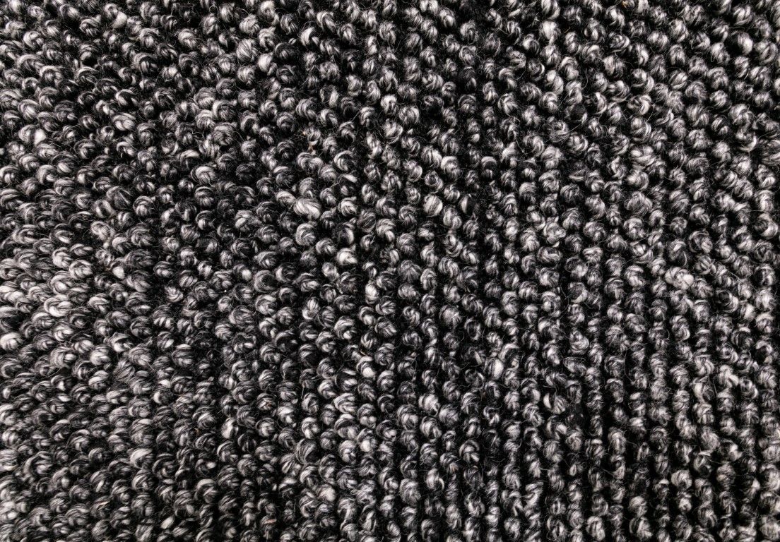 The Avenue 160 Round Charcoal Rug in durable PET yarn with a wool-like feel. Size 160 Diameter. Close.