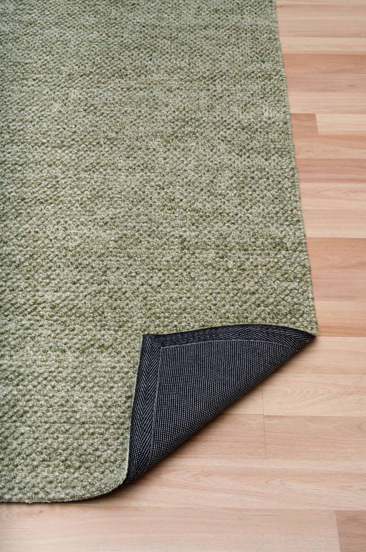 Avenue Pesto is a hand woven PET Yarn (Recycled Plastics) Rug. It features a soft wool-like feel with a modern/contemporary design. Colour Pesto Green. Sizes 155 X 225, 200 X 290, 240 X 320 and 300 X 400. Fold.