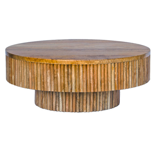 The Buddy Coffee Table is a contemporary/coastal rounded coffee table. Crafted with a solid top, textured sides and base, it is constructed of sustainable fruitwood. Colour natural. Measures 1000 diameter X 380 height. Front Plain.