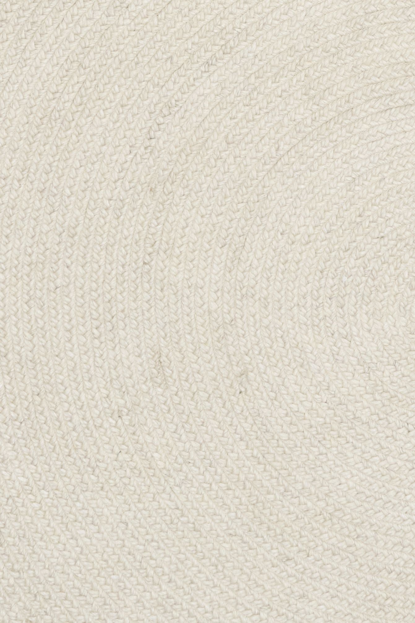 Cora Round Ivory Rug hand woven from 70% New Zealand wool and 30% viscose in a braided weave. Colour Ivory. 2 sizes, 200cm round and 250cm round. Close View.