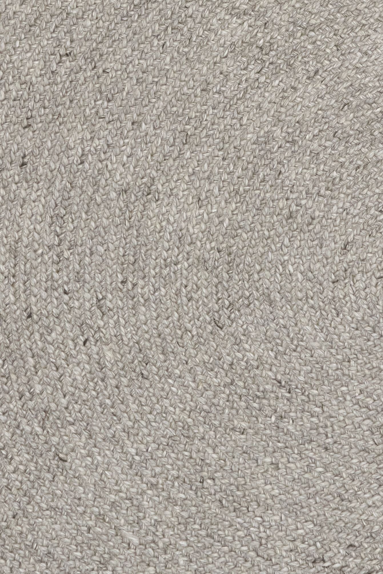 Cora Round Silver Rug hand woven from 70% New Zealand wool and 30% viscose in a braided weave. Colour Silver Grey. 2 sizes, 200cm round and 250cm round. Close View.