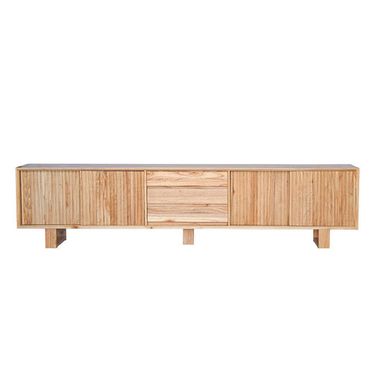 The Crosby Natural, featuring 4 Sliding Doors and 3 drawers. This entertainment unit boasts a modern design and ample storage. Crafted from solid white cedar. Colour Natural. Measures 2500 Length x 400 Depth x 600 Height. Front Plain.