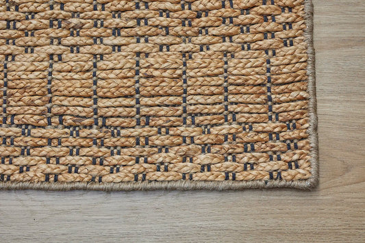 Daintree - California is a rug made with panja hand woven natural coloured jute. Features a 7-9mm pile height. Colour Natural with Black. Sizes 160 X 230, 200 X 290 and 240 X 340. Corner.