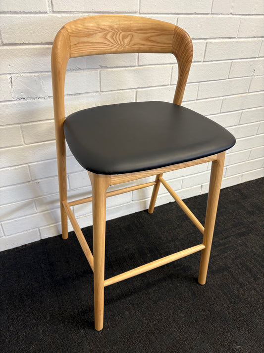 The Danube with Back - Natural Black Barstool. A contemporary style barstool. Solid natural ash frame with black polyurethane seat. Measures 470W X 450D X 670 Seat Height. Back Height 920. Angle.