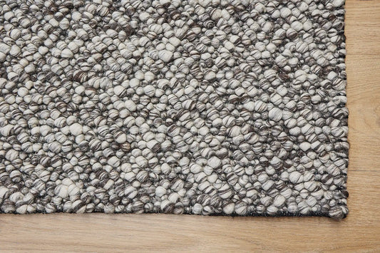 Dunes Brownie is a hand-braided wool rug, giving it a textured, luxurious feel. With a 16-18mm pile height. Colour Brown and White. Sizes 160 X 230, 200 X 290 and 240 X 340. Corner.