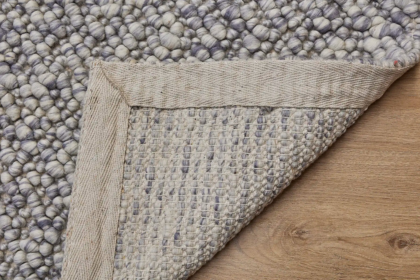Dunes Pigeon is a hand-braided wool rug, giving it a textured, luxurious feel. With a 16-18mm pile height. Colour Light blues and white. Sizes 160 X 230, 200 X 290 and 240 X 340. Fold.