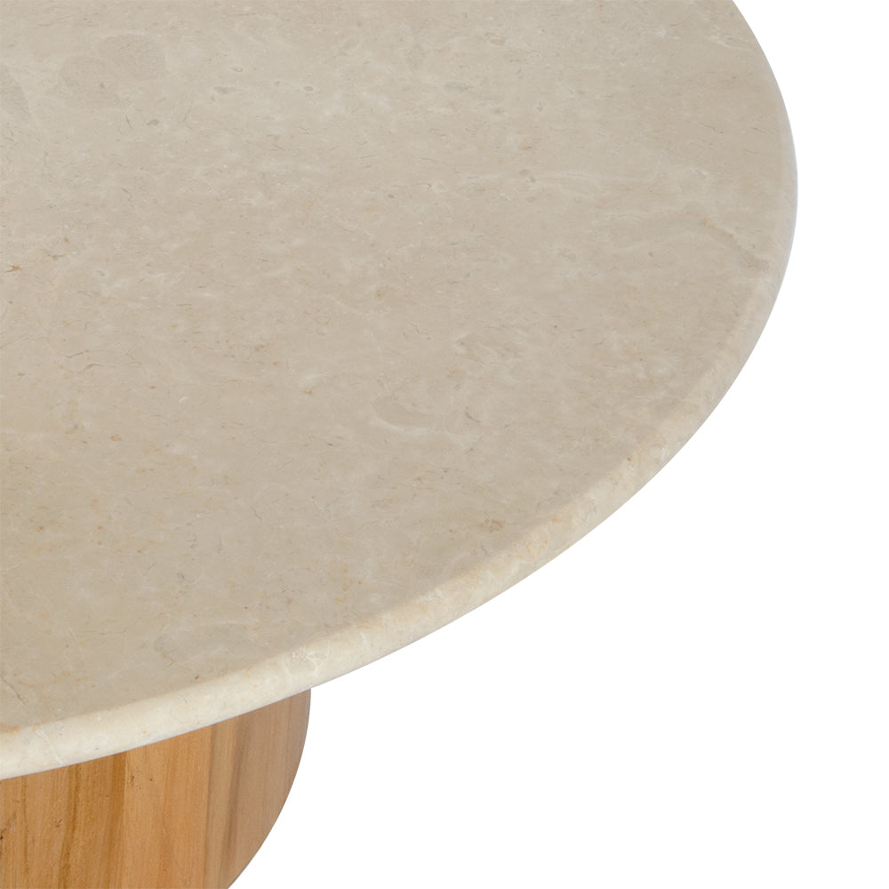 The Dylan Marble Top Coffee table is a contemporary styled round coffee table. Crafted from solid marble with a round teak base. Colour natural. Measures 1000 diameter X 400 height. Top Corner.