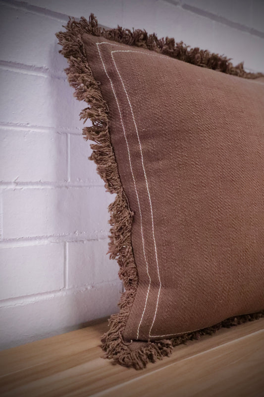 The Earthy, brown, throw cushion is crafted from skilled artisans in India. Made of Cotton Slub which is a cotton fabric with a textured feel. Colour brown. Sizes, 50 X 50 and 60 X 60. Angle.