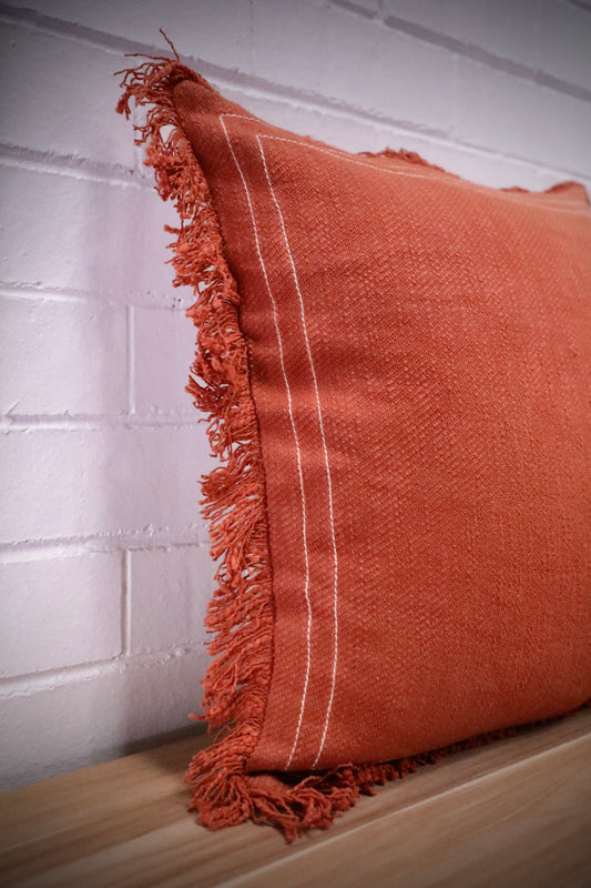 The Earthy Terracotta, throw cushion is crafted from skilled artisans in India. Made from Cotton Slub for a soft texture. Colour terracotta. Sizes, 50 X 50 and 60 X 60. Angle.
