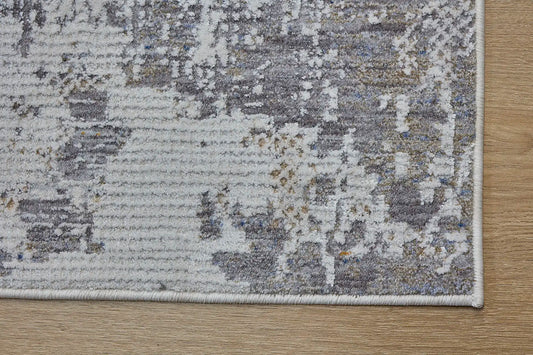 Eclipse Distress is a machine made rug. Its design boasts an abstract modern/contemporary feel. Crafted from Polyester with a low-profile 7-9mm pile height. Colours Grey and light grey tones. Sizes 160 X 230, 200 X 300 and 240 X 340. Corner.