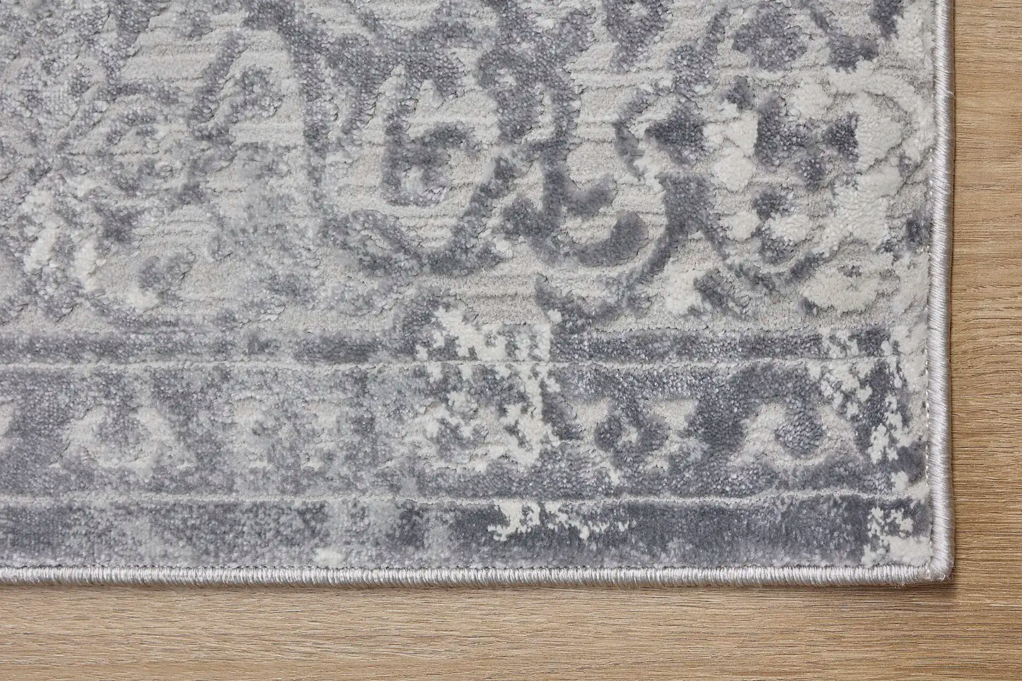 France Grey is a machine made rug. Its design boasts a traditional floral feel. Crafted from Polyester, with a low-profile 7-9mm pile height. Colours Light Grey and Grey tones. Sizes 160 X 230, 200 X 290, 240 X 340 and 300 X 400. Corner.