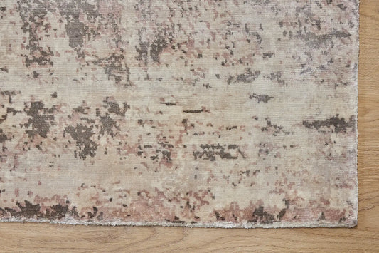 Fusion Taupe is a handcrafted rug made of luxurious bamboo silk and viscose. It features a textured, intricate, and opulent weave with a pile height of 12-14mm. Colours Grey, Light Grey and Beige Blend. Sizes 160 X 230, 200 X 290 and 240 X 340. Corner.