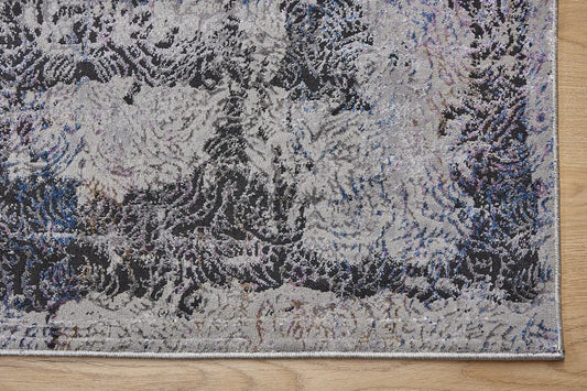 Geneva Grey is a machine made rug. Its design boasts a abstract modern/contemporary feel. Crafted from Viscose and Polyester, with a low-profile 7-9mm pile height. Colours Light Grey with Blue and Black accent tones. Sizes 160 X 230, 200 X 290 and 240 X 340. Corner.