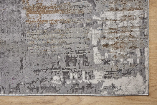 Geneva Lilac is a machine made rug. Its design boasts a modern/contemporary feel. Crafted from Viscose and Polyester, with a low-profile 7-9mm pile height. Colours Light Grey with Blue and Beige accent tones. Sizes 160 X 230, 200 X 290 and 240 X 340. Corner.