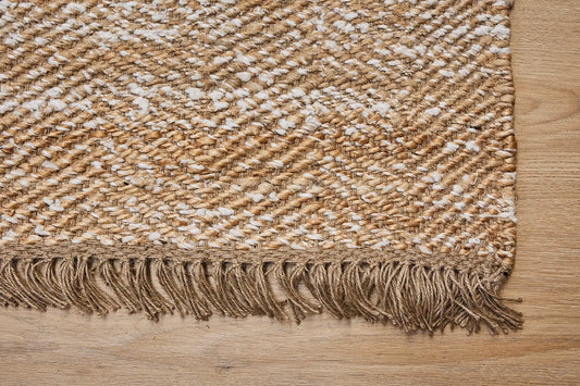 Goldfield Gardie is a rug made with panja hand woven natural coloured jute. Features a 7-9mm pile height. Colour Natural with White accents. Sizes 160 X 230, 200 X 290 and 240 X 340. Corner.