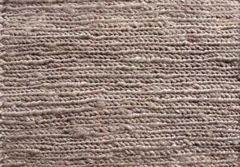 The Hemp Round - Grey, hand-woven rug. Made in India, it features a round shape in two sizes, 160 and 190 Diameter. Colour, Silver grey. Close.