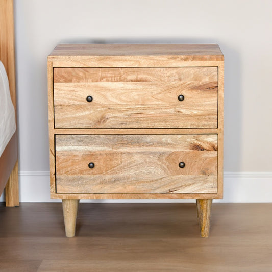 The Hood 2 Drawer Bedside is a contemporary designed nightstand. Crafted from fruitwood, it features 2 drawers with wooden drawer runners. Colour natural. Measures 610 wide X 400 depth X 660 height. Life.