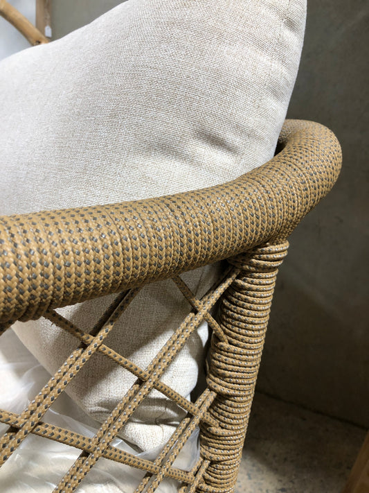 The Camellia Occasional Chair. Made with sustainable solid teak frame, with rope, and UV resistant cotton twill cushions. This occasional chair exudes style while providing comfort and durability. Measures 770 Wide X 800 Depth X 700 Back Height - 470 Seat Height. Side Close.