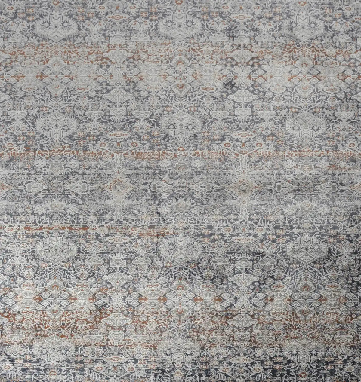 Indus Fume is an exquisite traditional tribal design rug. It is machine made of luxurious Viscose and Polyester. Colours Beige, Brown, blue and Cream accents. Sizes 160 X 230, 200 X 300 and 240 X 330. Full.