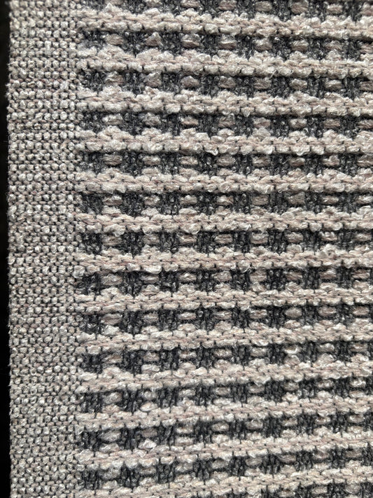 Katana Light Grey indoor/outdoor rug featuring light grey/grey tones and a subtle textured pattern, power-loomed from UV-stabilised polypropylene for lasting durability. Colour light grey. 3 sizes. Side.