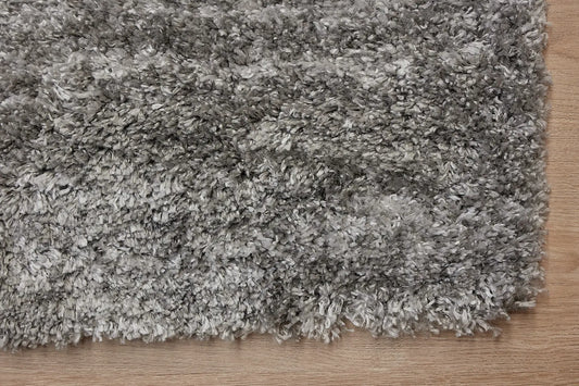 Konya Dark Grey is a Moroccan/Boho inspiration rug. Machine made of Polyester, this shaggy style rugs brings added soften textures. Colours Dark Grey, Grey and Light Grey. Sizes 160 X 230, 200 X 290, 240 X 340 and 300 X 400. Corner.