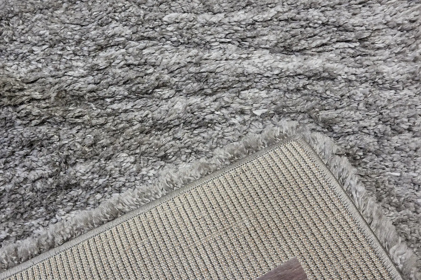 Konya Dark Grey is a Moroccan/Boho inspiration rug. Machine made of Polyester, this shaggy style rugs brings added soften textures. Colours Dark Grey, Grey and Light Grey. Sizes 160 X 230, 200 X 290, 240 X 340 and 300 X 400. Fold.