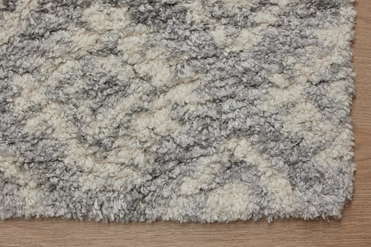 Konya Geo is a Moroccan/Boho inspiration rug. Machine made of Polyester, this shaggy style rugs brings added soften textures. Colours Blue, White and Light Grey. Sizes 160 X 230, 200 X 290, 240 X 340 and 300 X 400. Corner.