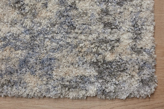 Konya Sand is a Moroccan/Boho inspiration rug. Machine made of Polyester, this shaggy style rugs brings added soften textures. Colours Grey, White, Beige and Light Grey. Sizes 160 X 230, 200 X 290, 240 X 340 and 300 X 400. Corner.