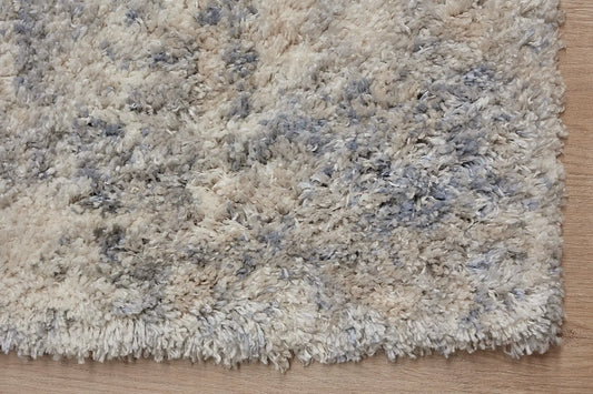 Konya Taupe is a Moroccan/Boho inspiration rug. Machine made of Polyester, this shaggy style rugs brings added soften textures. Colours Grey, White, and Light Grey. Sizes 160 X 230, 200 X 290, 240 X 340 and 300 X 400. Corner.