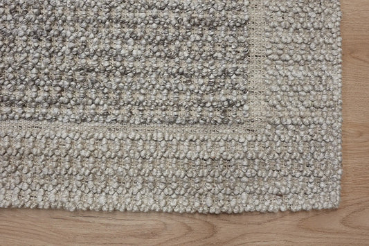 Liberty Walnut is an eco-luxury rug crafted with hand woven recycled PET (plastic bottles) yarn. Boasting a super soft textured loop pile and pile height of 16-18mm. Colour Cream and Beige/Brown. Sizes 160 X 230, 200 X 290, 240 X 340 and 290 X 390. Corner.