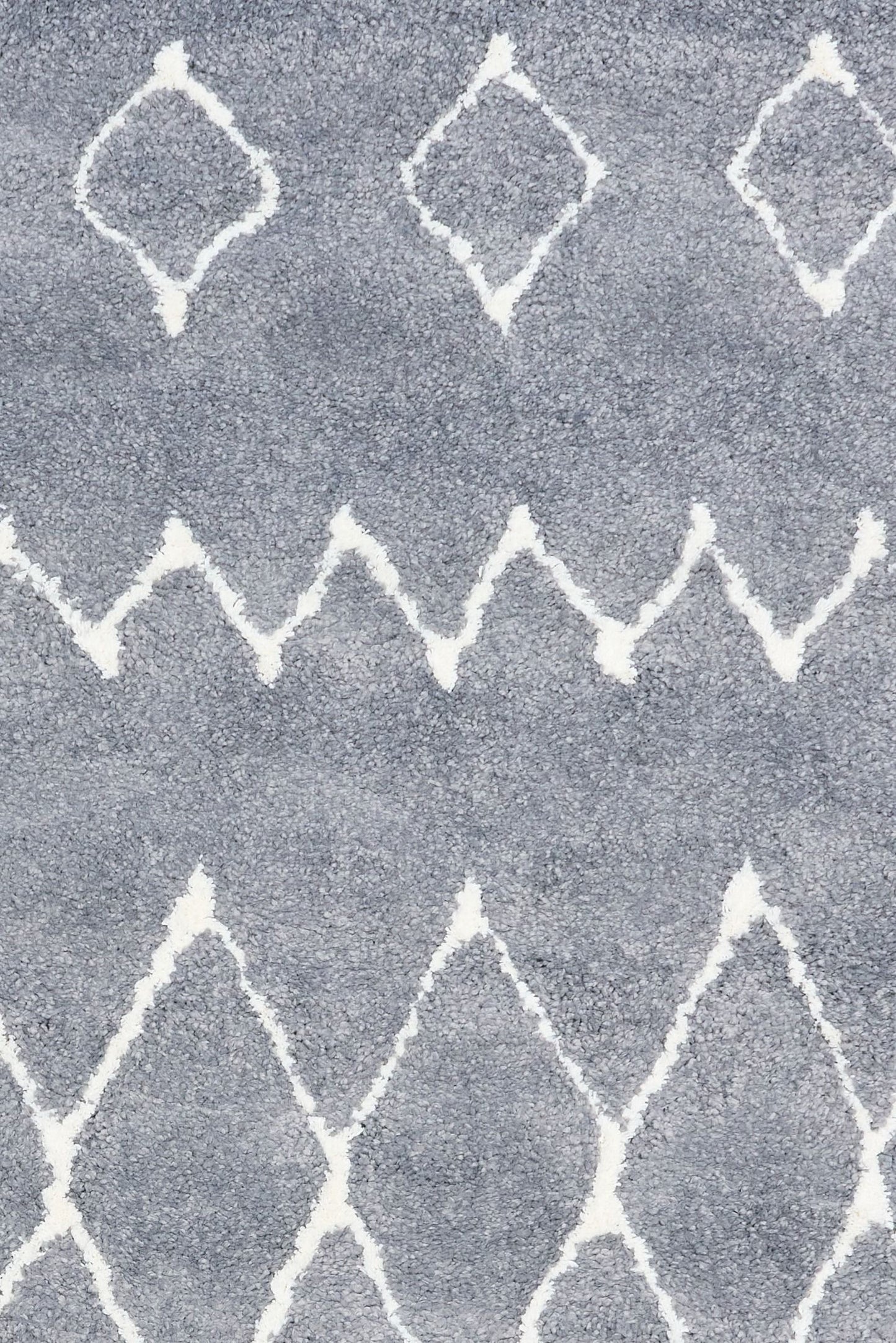Luana Band Grey Ivory is a machine made polypropylene rug. It features a shaggy pile with a moroccan boho inspired design. Colours Grey with Ivory White patterns. Sizes 160 X 230, 200 X 290, 240 X 320 and 300 X 390. Close.
