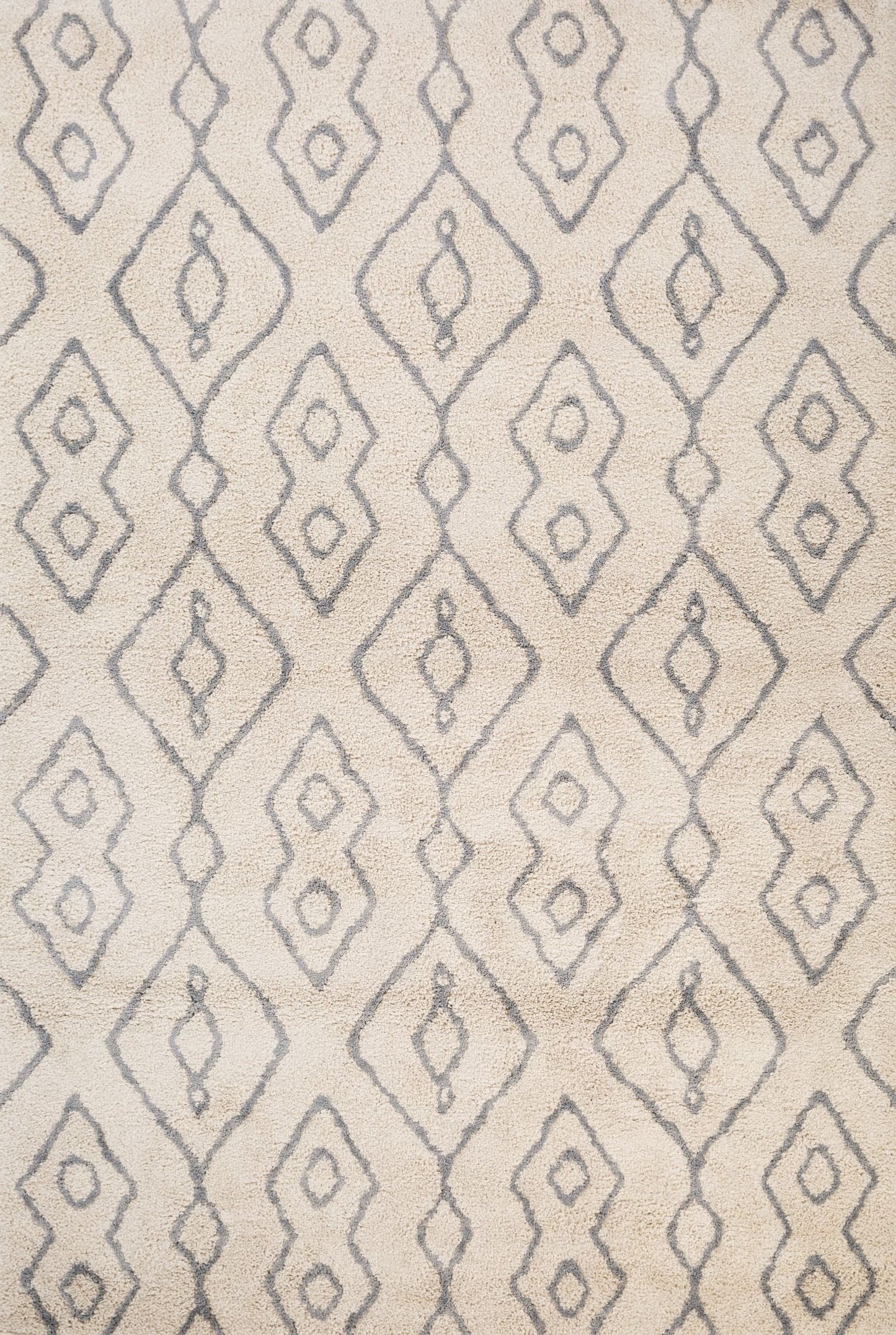 Luana Column Ivory Grey is a machine made polypropylene rug. It features a shaggy pile with a moroccan boho inspired design. Colours Ivory with grey moroccan inspired diamond patterns. Sizes 160 X 230, 200 X 290, 240 X 320 and 300 X 390. Top.