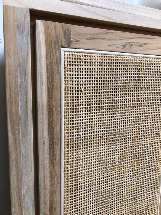 The Manzanita 4 Door Buffet is a contemporary and coastal four-door sideboard crafted from sustainable teak. The sideboard features open mesh rattan doors. Colour natural. Measures 1500 length X 400 depth X 950 height. Front Corner.