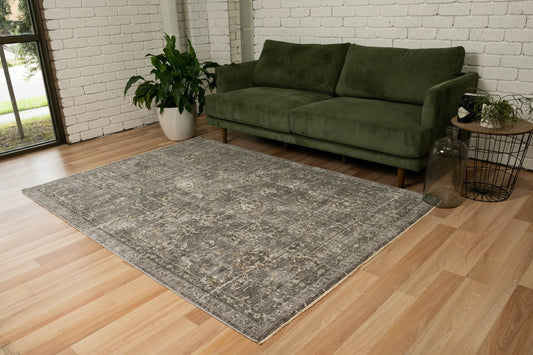 The Matana Grey 1330 Rug. Traditional style, machine made rug. Colours grey, dark grey, beiges and creams. Sizes 160 X 235, 200 X 285, 240 X 330 and 300 X 400. Life.