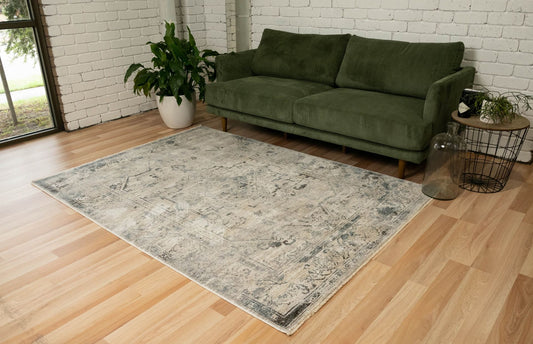 The Matana Grey 4154 Rug. Traditional style, machine made rug. Colours grey, light grey's and blue grey's. Sizes 160 X 235, 200 X 285, 240 X 330 and 300 X 400. Life.