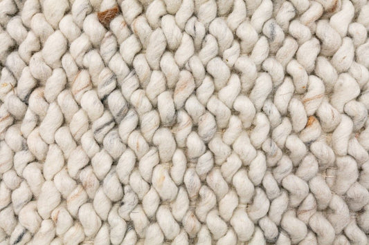 Oslo Greyology 1364 is a textured hand woven, piled loop wool rug. Colours white with grey, black and brown accents. Sizes 155 X 225, 200 X 290, 240 X 320 and 300 X 400. Close.