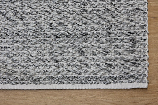 Oxford Grey is a hand-braided rug with a contemporary design. Crafted with wool and polyester for a textured feel, the rug has a pile height of 7-9mm. Colour White,Grey and Black. Sizes 160 X 230, 200 X 290, 240 X 340. Corner.