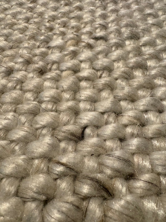 Pacific Grey is a handwoven wool and polyester rug with a low-textured cross weave. It boasts a soft pile height of 7-9mm. Colour White with grey and black accents. Sizes 160 X 230, 200 X 290, 240 X 340 and 300 X 400. Super Close.