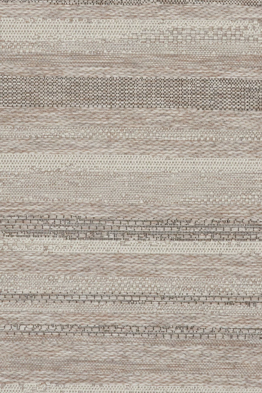 The Patio Linear Linen indoor/outdoor rug featuring neutral tones and a subtle textured pattern, power-loomed from UV-stabilised polypropylene for lasting durability. Colours, Linen, Beiges and hints of black. 3 sizes. Close.