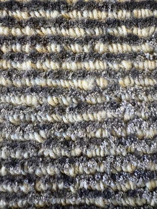 Pearl Garnet is a luxurious hand-loomed knotted rug made with wool and silky viscose. It boasts a ribbed texture and pile height of 12-14mm. Colour Blueish Grey with Beige accents. Sizes 160 X 230, 200 X 290 and 240 X 340. Close.