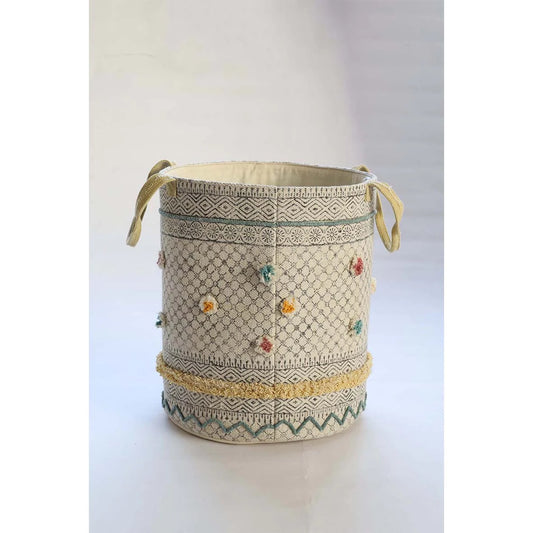 The Pearled Cotton Block Print Basket, boasts a bold motif block print design and 2 handles. Featuring an interior cotton lining and an outer textured cotton cover. Colours, creams, dark blues, yellows and browns. Size 400 height X 350 diameter. Side Plain.