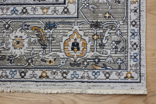 Persia Taupe is a machine made traditional designed rug crafted from luxurious polyester for soft feel. It has a 7-9mm Pile height. Colours grey with beige and blue accents. Sizes 160 X 230, 200 X 290, 240 X 340 and 300 X 400. Corner.