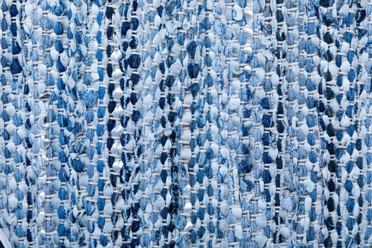 Rustic Charm Blue is a hand woven natural jute and leather carpet. Colour Light Blue and Blue. Sizes 155 X 225, 200 X 290, 240 X 320 and 300 X 400. Close.